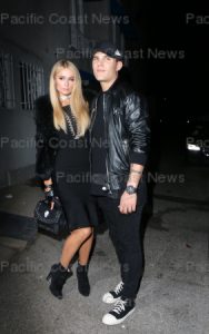 165854, Paris Hilton and Chris Zylka, the loved up couple in matching black, arrive at the Revolve Madeworn XRoc96 social club party in Hollywood. Los Angeles, California - Wednesday May 31, 2017. Photograph: © MHD, PacificCoastNews. Los Angeles Office (PCN): +1 310.822.0419 UK Office (Avalon): +44 (0) 20 7421 6000 sales@pacificcoastnews.com FEE MUST BE AGREED PRIOR TO USAGE