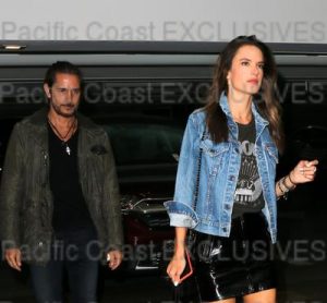 EXCLUSIVE: Alessandra Ambrosio goes for a rock chick look in denim jacket, Ramones t-shirt and black mini skirt as she arrives at Soho House in LA with filmmaker Raul Guterres following her recent break-up with fiancé Jamie Mazur. Los Angeles, California - Friday April 27, 2018.  Photograph: © MHD, PacificCoastNews. Los Angeles Office (PCN): +1 310.822.0419 UK Office (Avalon): +44 (0) 20 7421 6000 sales@pacificcoastnews.com FEE MUST BE AGREED PRIOR TO USAGE